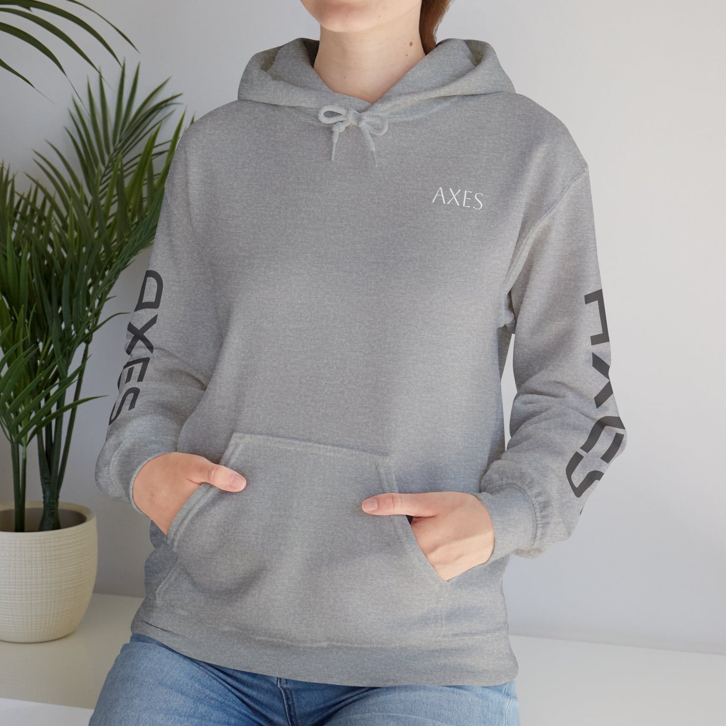 Stylish Unisex Heavy Blend™ Hooded Sweatshirt - Modern Design with 'AXES' Graphics